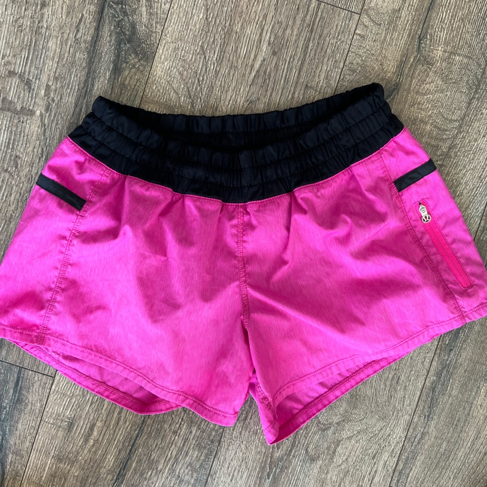 Lululemon womens swim/ surf shorts hot pink with black trim, size 6